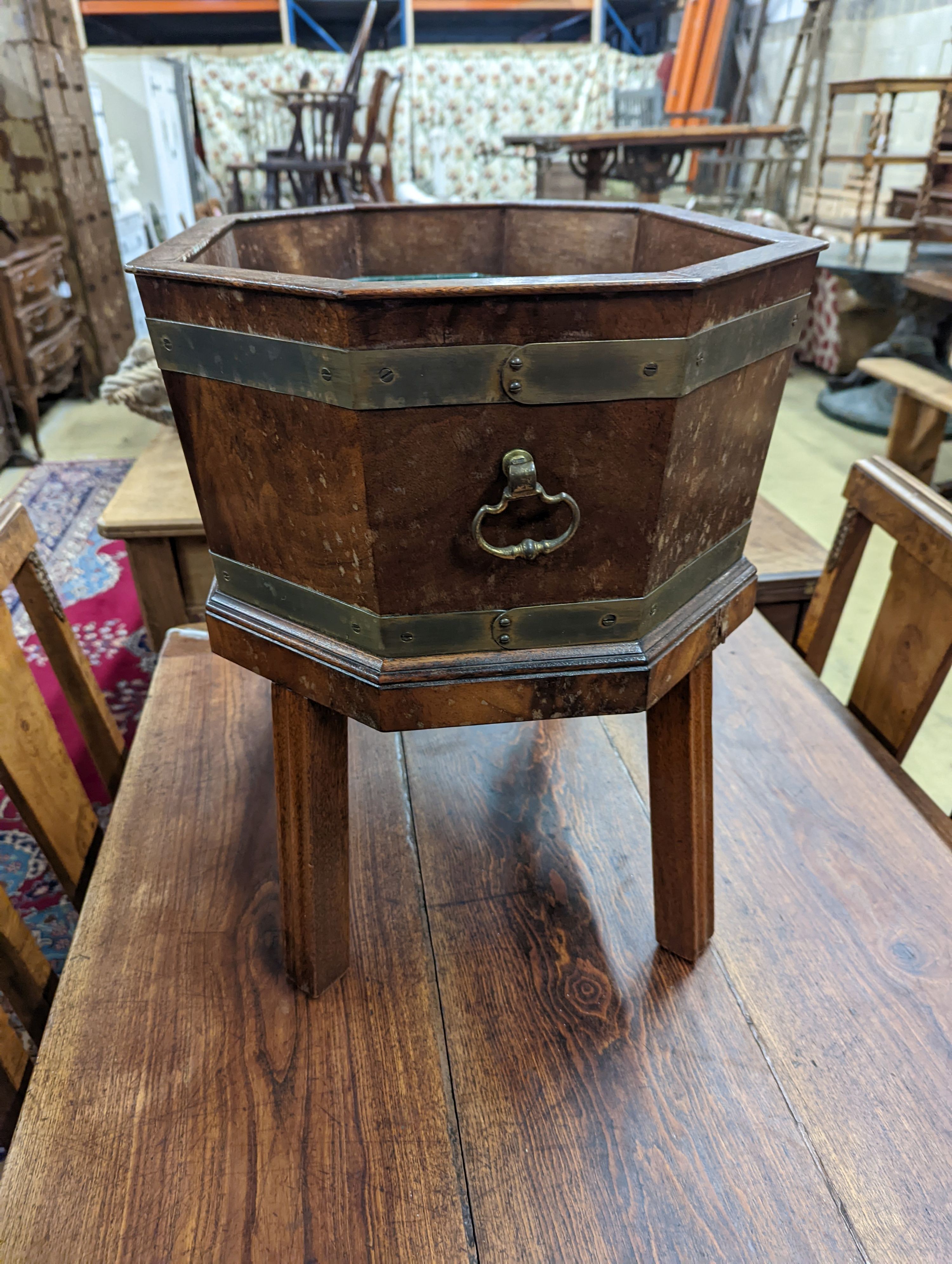 A George III style octagonal brass bound wine cooler. W-55cm, D-40cm, H-49cm.